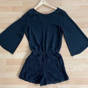 Costa Blanca black romper with lace shorts and flowey top